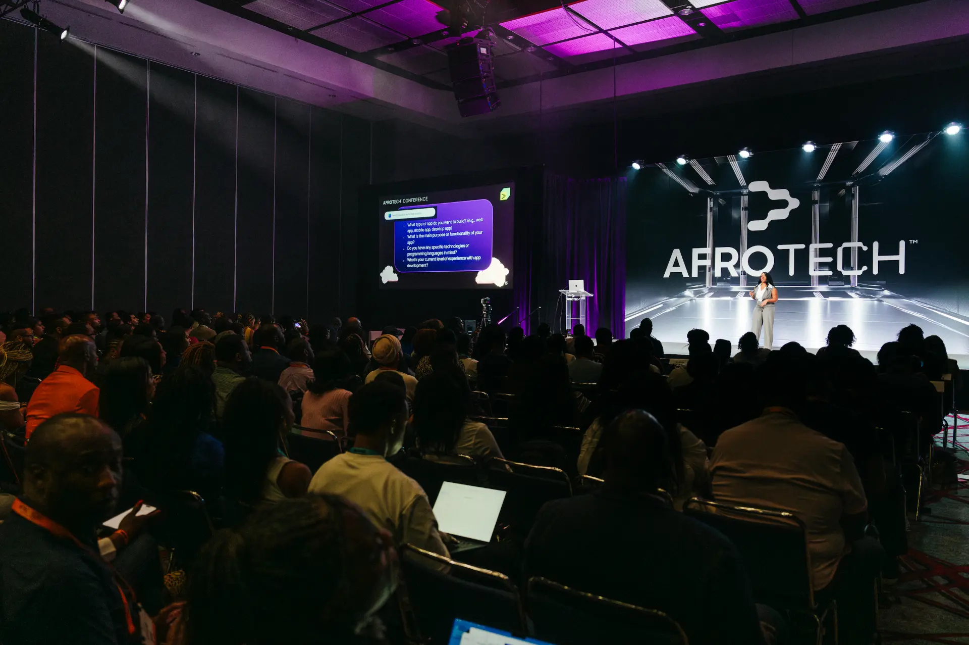 Shadeira Nesmith presenting on stage at the AFROTECH conference